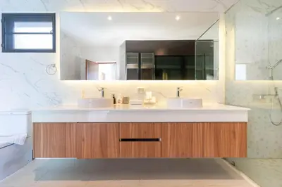 a bathroom with two sinks and a large mirror at 5 minutes from Laguna - Private Pool 3BR in Laguna Phuket