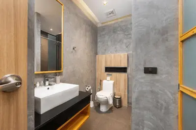 a bathroom with a sink and a toilet at Relife Rio 2 min to Nai Harn beach in Rawai Beach