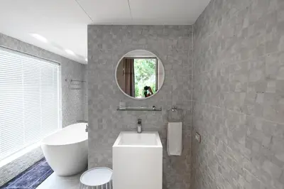 a bathroom with a toilet and a sink and a mirror at Luxury Villa Residence near Laguna in Ban Pak Lak
