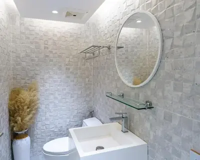 a bathroom with a white sink and a mirror at Luxury Villa Residence near Laguna in Ban Pak Lak