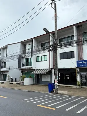 a building on the side of a street at Come see comsa in Koh Lone