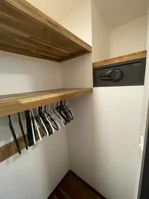 a kitchen with a shelf with cooking utensils at Rawai Title 3 in Rawai Beach