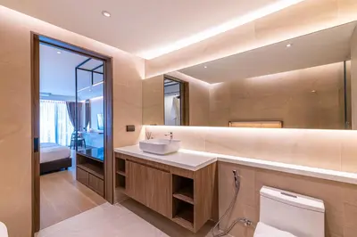 a bathroom with a sink and a mirror at P Villas Patong in Patong Beach
