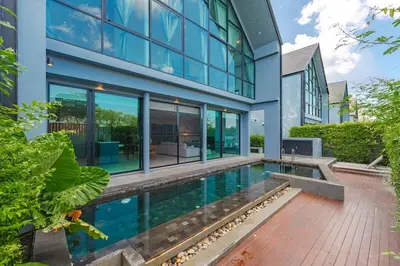an exterior view of a house with a swimming pool at V188 The Granary Loft Haven 3BR Pool Sanctuary in Bang Tao Beach