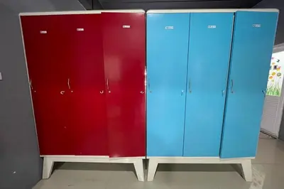 two blue and red cabinets sitting next to each other at Pocket Pillow Patong in Patong Beach