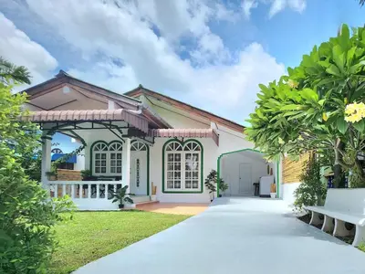 a house with a pathway in front of it at Village Beach House II in Patong Beach