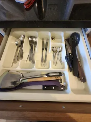 a white tray with utensils on a counter at veloche group 2 in Karon Beach