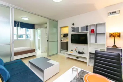 a living room with a couch and a tv at Tony DCondo in Kathu