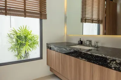 a bathroom with a sink and a large window at Mouana Breeze Maikhao VIP 4-bedroom Pool Villa 9915 in Mai Khao Beach