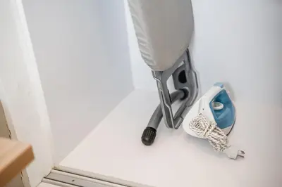 a white floor with a toilet in a room at C176 Diamond Paradise Getaway Condo Phuket in Bang Tao Beach