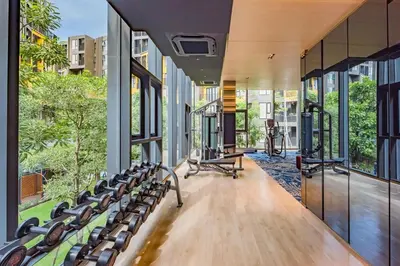 an empty gym with benches and large windows at The Base Central Phuket-B20W in Ban Rangeng