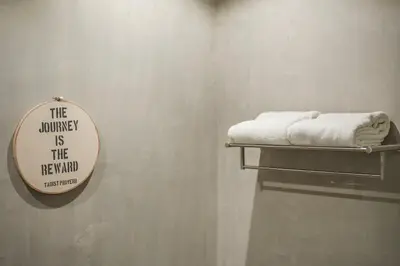 a sign that reads the laundry is the new normal at C179 Serene and Stylish Getaway in Kamala, Phuket in Kamala Beach
