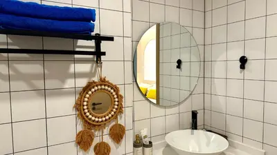 a bathroom with a sink and a mirror at Fantasea Kamala Beach 1 BR 313 in Kamala Beach