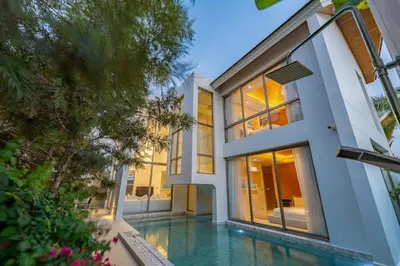 a house with a swimming pool in front of it at V183 Lux Pride Villas 3BR Private Pool Retreat in Bang Tao Beach