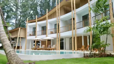 an exterior view of a resort with a swimming pool at The TALAY in Ban Na Tai