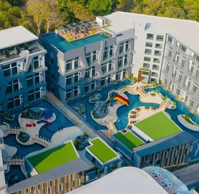 an aerial view of a resort with a water park at C181 Stylish 1BR Loft Near Naiharn Beach Pool Gym in Rawai Beach