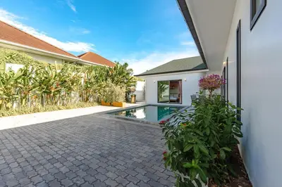 an external view of a house with a swimming pool at V193 Next-Door Villas 6BR 2 Pools For Group Vibe! in Rawai Beach