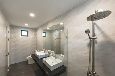 a bathroom with two sinks and a shower at V193 Next-Door Villas 6BR 2 Pools For Group Vibe! in Rawai Beach