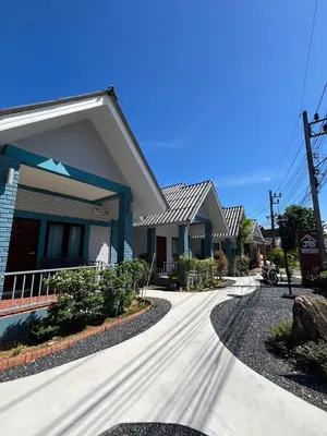 a house with a driveway in front of it at J&B House in Nai Yang Beach