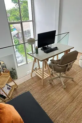 a desk with a computer and a chair in a room at ORIGINAL DESIGNED 2BR TownHouse6 MonkeyHill in Ban Sam Kong