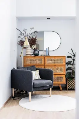 a living room with a couch and a mirror at ORIGINAL DESIGNED 2BR TownHouse6 MonkeyHill in Ban Sam Kong