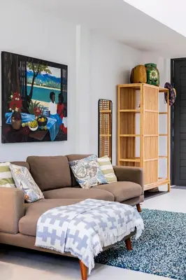 a living room with a couch and a table at ORIGINAL DESIGNED 2BR TownHouse6 MonkeyHill in Ban Sam Kong