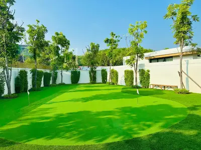 an image of a golf course with a green at Mouana Breeze Maikhao 3-bedroom Pool Villa 9917 in Mai Khao Beach