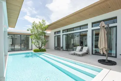 an image of a swimming pool in a house at Mouana Breeze Mai Khao 4-bedroom Pool Villa 9925 in Mai Khao Beach