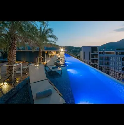 a large swimming pool on top of a building at City Gate Apartments Kamala Beach Phuket Thailand - LMY in Kamala Beach