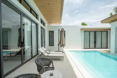 an image of a swimming pool in a house at Mouana Breeze Mai Khao 4-bedroom Pool Villa 9922 in Mai Khao Beach