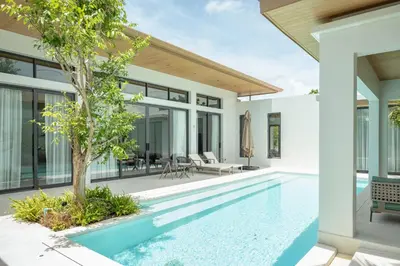 an image of a swimming pool in a villa at Mouana Breeze Mai Khao 4-bedroom Pool Villa 9920 in Mai Khao Beach