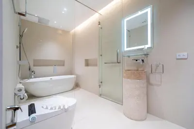 a bathroom with a tub and a sink and a shower at The Trinity new modern 5BR villa with 20M Pool in Thalang