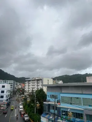 a view of a city with traffic and buildings at SK Residence And Restaurant Patong in Patong Beach