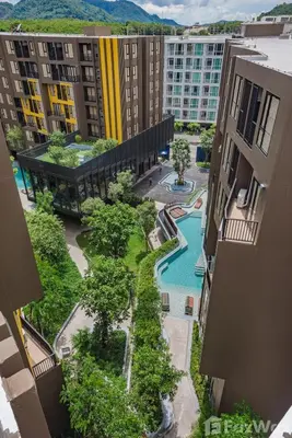 an aerial view of a resort with a pool and buildings at The Base Central Phuket-B42WL in Ban Rangeng