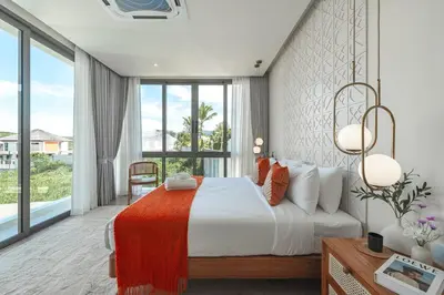 a bedroom with a bed and a large window at V185 New Modern Villa with Private Pool in Bang Tao Beach