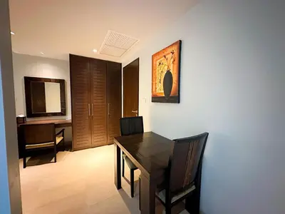 a dining room with a table and chairs and a desk at NEW Malee Resort Studio 858 in Rawai Beach