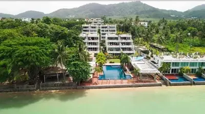 an aerial view of a resort on the water at NEW Malee Resort Studio 858 in Rawai Beach