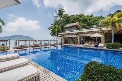 a large swimming pool next to a resort at NEW Malee Resort Studio 858 in Rawai Beach