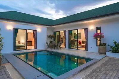 a villa with a swimming pool in a house at V189 Stylish 3BR Hideaway Pool & Beach Vibes in Rawai Beach