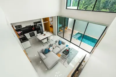 an overhead view of a living room and kitchen with a pool at V190 Tropical Oasis 3BR Villa with Pool & Bathtub in Rawai Beach