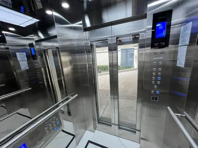 an elevator in a subway train with a window at Fantasea Condominium Kamala in Kamala Beach