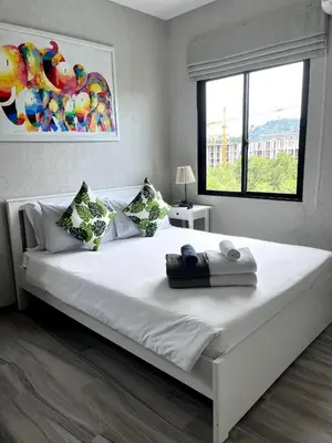 a large white bed in a bedroom with a window at B9 Ватсап669З5В2I976 in Nai Yang Beach