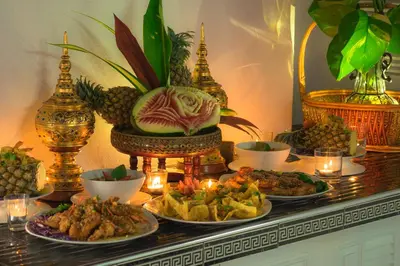 a buffet with plates of food on a table at Spacious 8BR Private Pool Villa in Chalong in Chalong