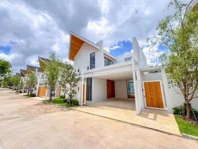 a house with white walls and a driveway at Tropical Living in Private Pool 3BR Villa in New Residence LuxPride 4 L9 in Bang Tao Beach