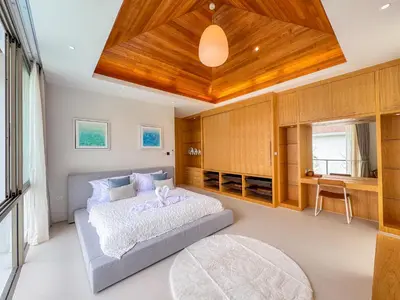 a bedroom with a bed and a wooden ceiling at Tropical Living in Private Pool 3BR Villa in New Residence LuxPride 4 L9 in Bang Tao Beach
