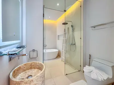 a bathroom with a shower and a toilet and a sink at Tropical Living in Private Pool 3BR Villa in New Residence LuxPride 4 L9 in Bang Tao Beach