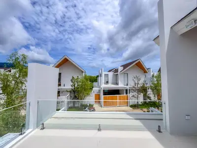 a view from the balcony of a house at Tropical Living in Private Pool 3BR Villa in New Residence LuxPride 4 L9 in Bang Tao Beach