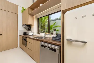 a kitchen with a sink and a window at Qabalah 2BR Villa Pool Rooftop Near Bangtao by TropicLook in Bang Tao Beach