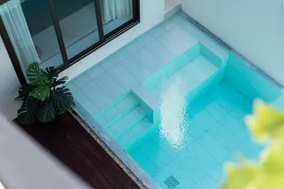 an overhead view of a swimming pool in a house at Qabalah 2BR Villa Pool Rooftop Near Bangtao by TropicLook in Bang Tao Beach