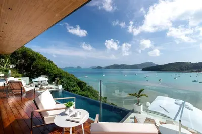 a balcony with a view of the ocean at Cliff Top Residence in Phuket Town